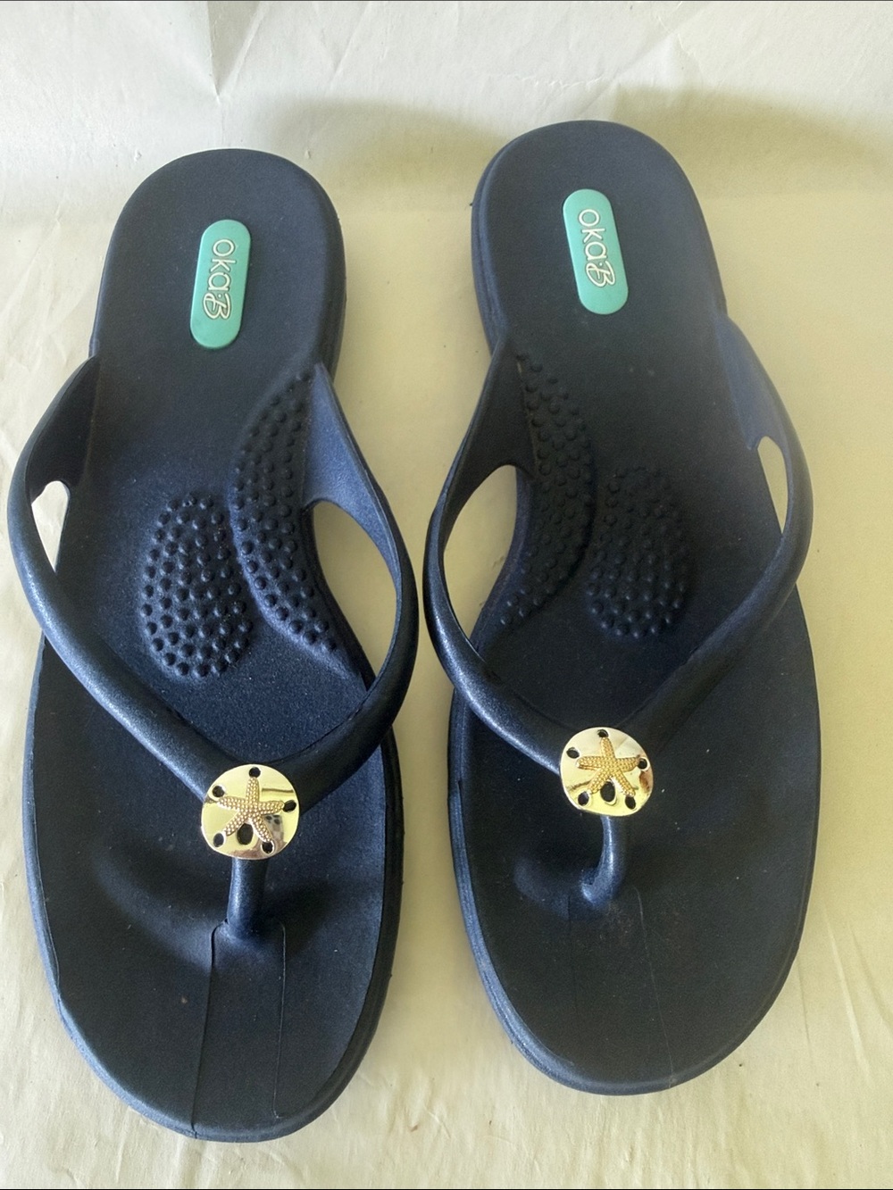 OKA b. Black Flip Flop Sandals with Gold Starfish Charm